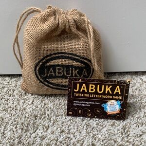 Jabuka Twisting Letter Word Game with Burlap Bag